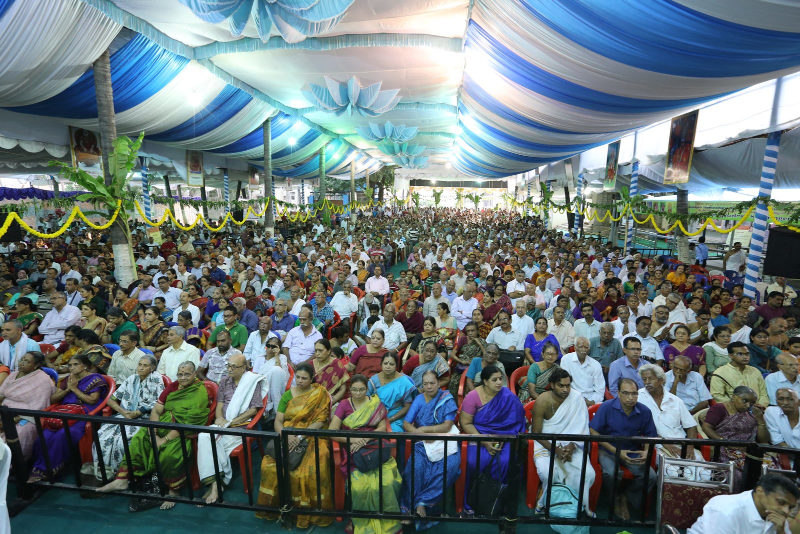 Devotees assembled under the pandal at the Sangeeta Aradhana