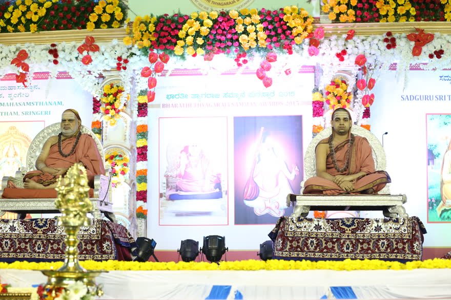 The dais, beneath the Acharyas of the Sharada Peetham
