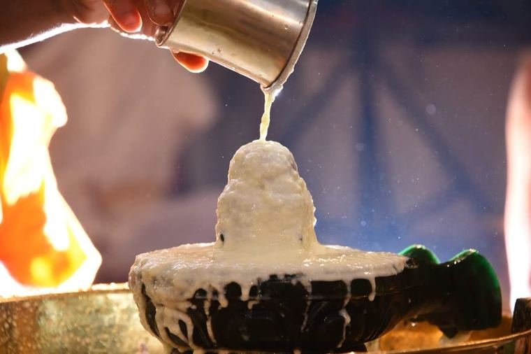 The abhishekam, milk poured without pause