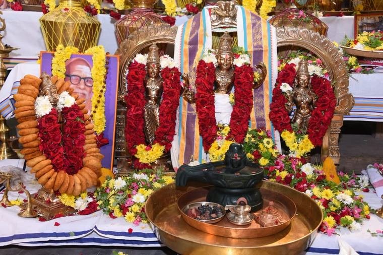 The altar, with the Guru Parampara