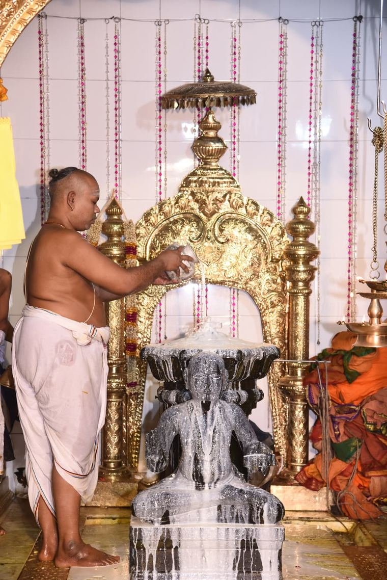 Abhishekam at the shrine