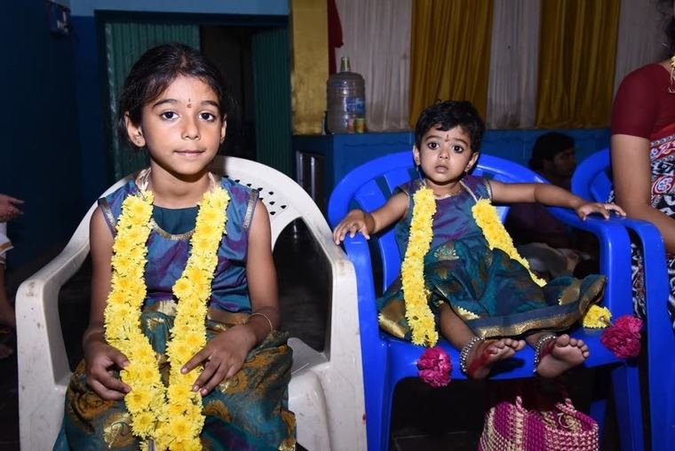 The youngest participants, garlanded