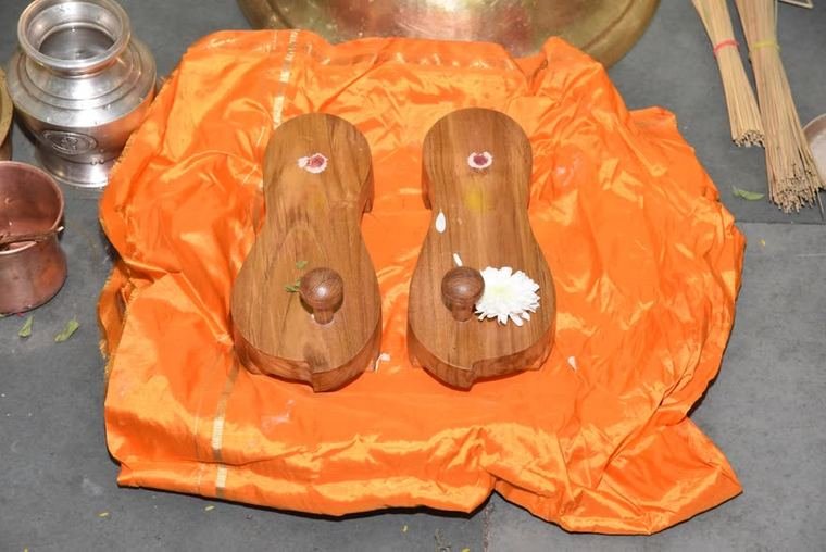 The padukas, set out for worship