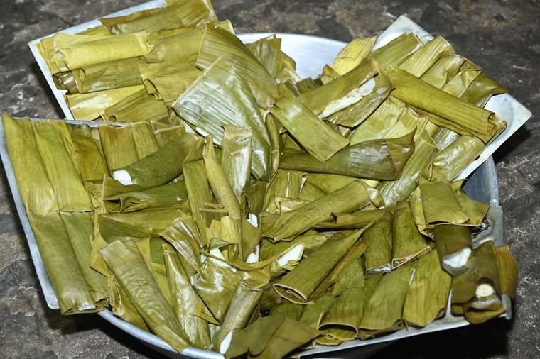 Prasadam wrapped in banana leaf
